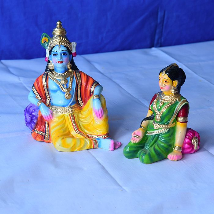 Lord Krishna and Rukmani relaxing - Clay idol set-Medium